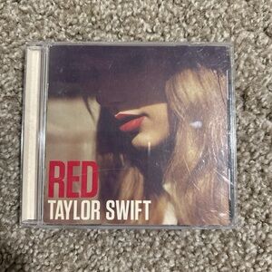 Taylor Swift Red Album Cover with Red and Tan Hues